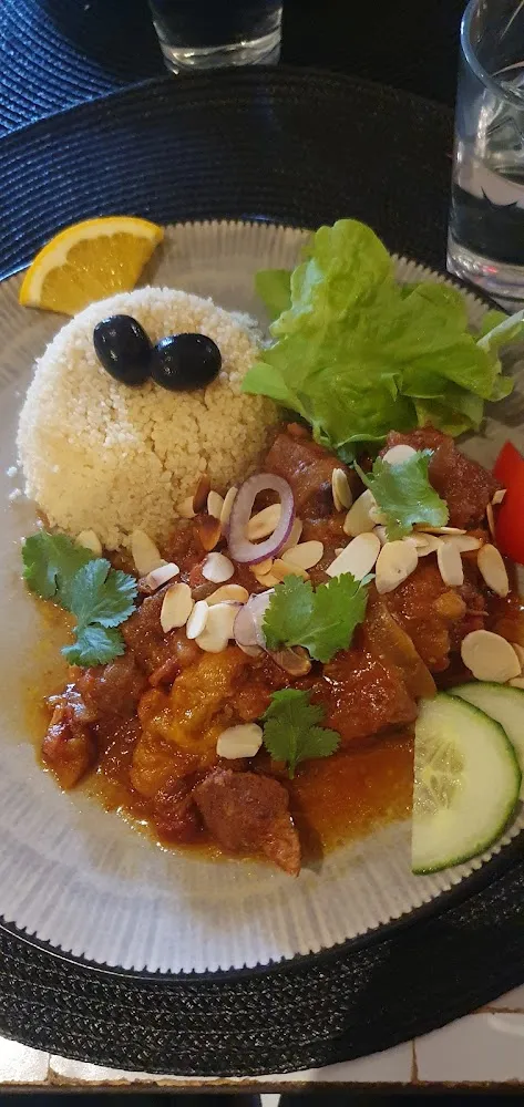 Porc Rôti Aux Pêches Miel Et Amandes Grillées